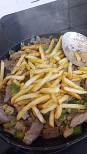 add fries to loaded steak and cheese fries